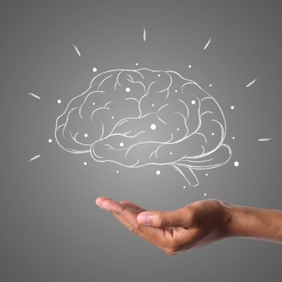 brain writes with white chalk is on hand, draw concept.